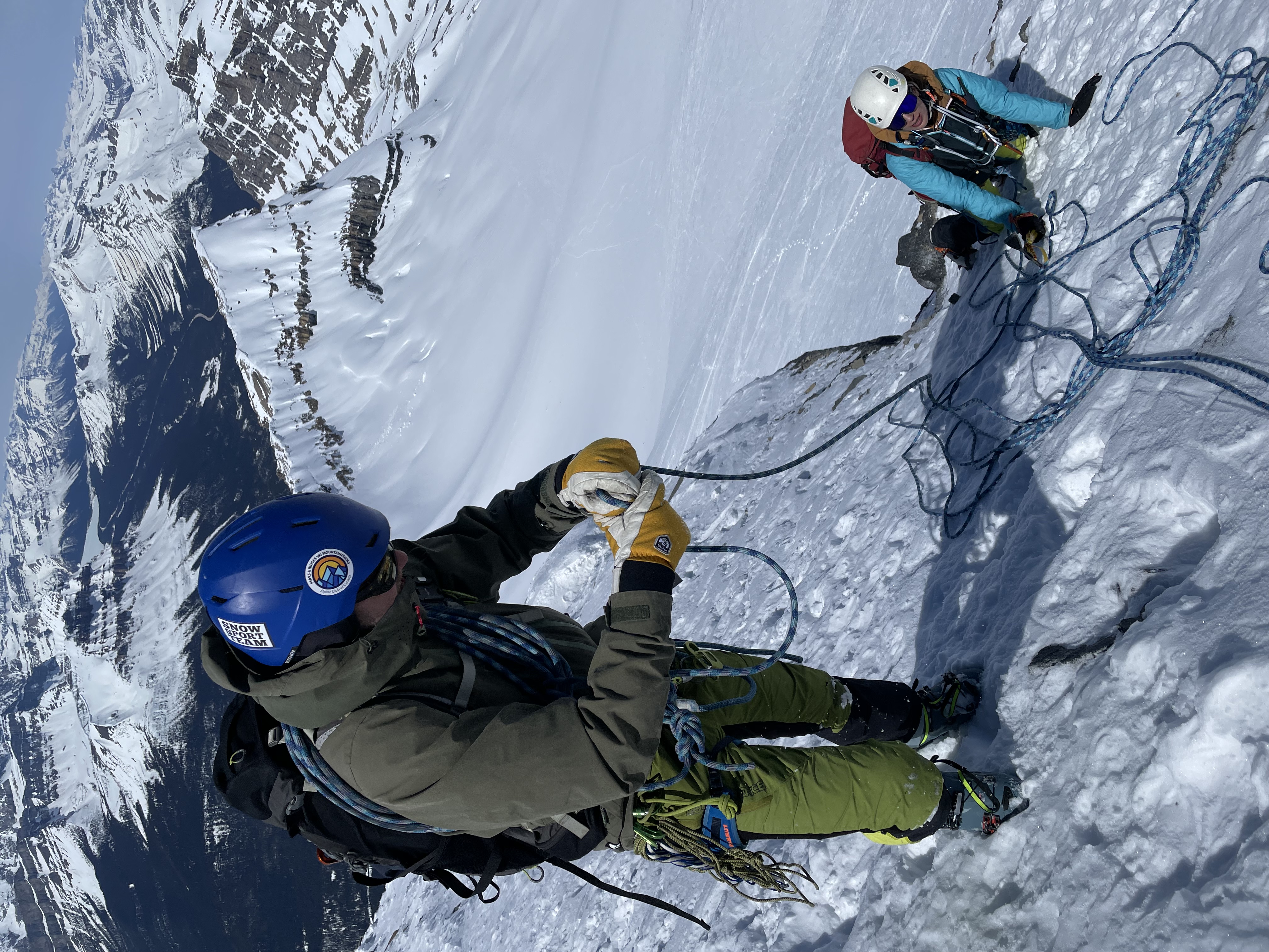 Skis stashed for the final climb